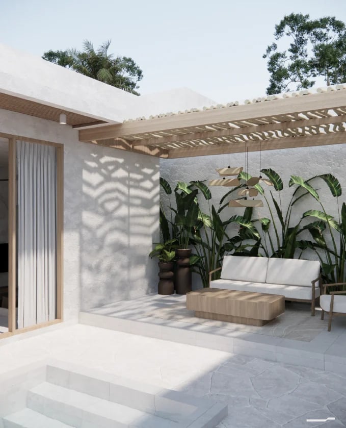 Modern patio with pergola, white outdoor seating, potted plants against white wall, and wooden steps leading up